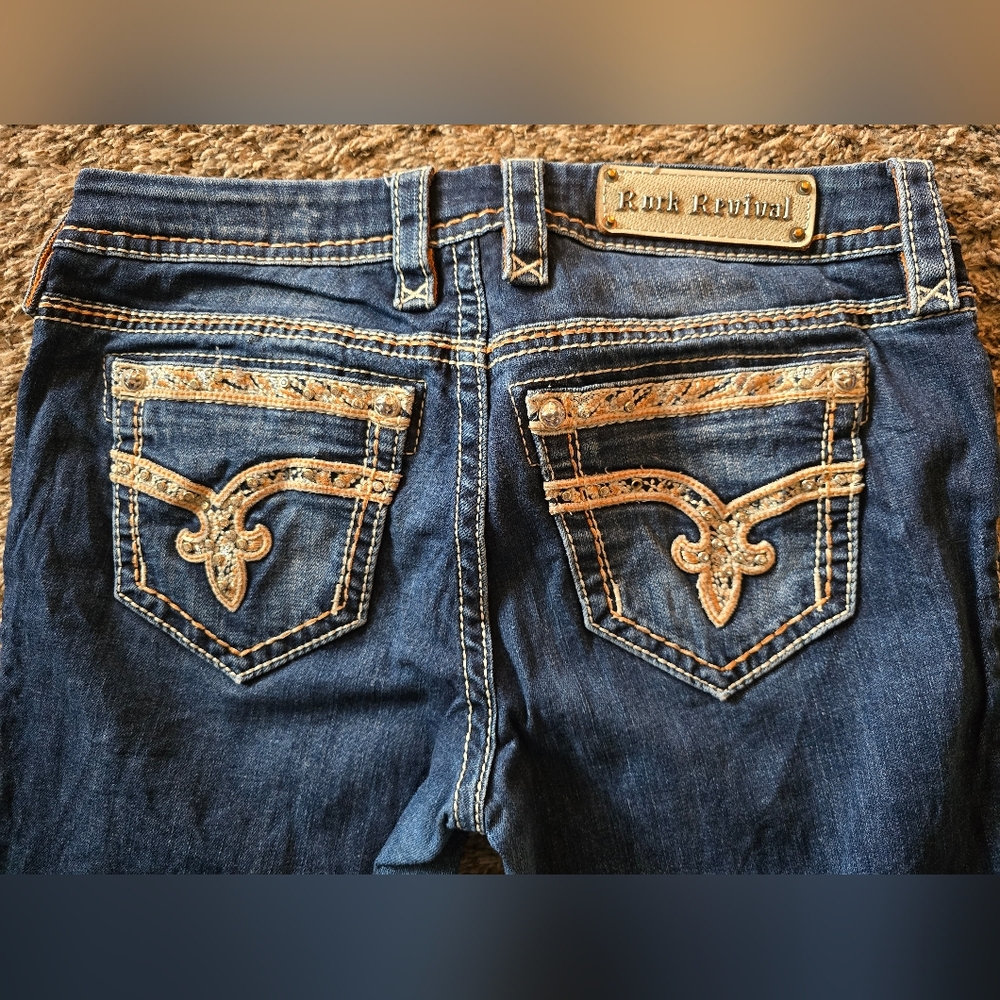 Rock Revival Blue Boot Cut Jeans with Ornate Stitching